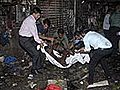 Three blasts rock Mumbai 21 killed | BahVideo.com