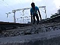 Yet another Darwin Award candidate under a train | BahVideo.com