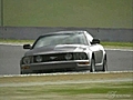 Mustang GT Videos - Mustang GT GT4 vs. Real Life Laguna Seca Video | BahVideo.com
