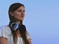 Girl in headphones on the skyline | BahVideo.com