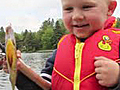 Boy Catches First Fish | BahVideo.com