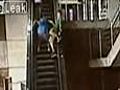 Teen falls off top of escalator | BahVideo.com