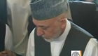 Karzai mourns dead half-brother climbs in grave | BahVideo.com